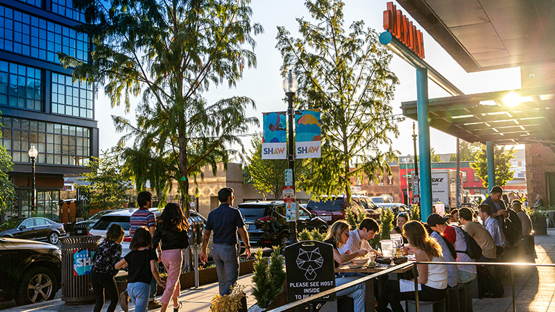 Sidewalk dining along a street in Shaw, Washington, DC