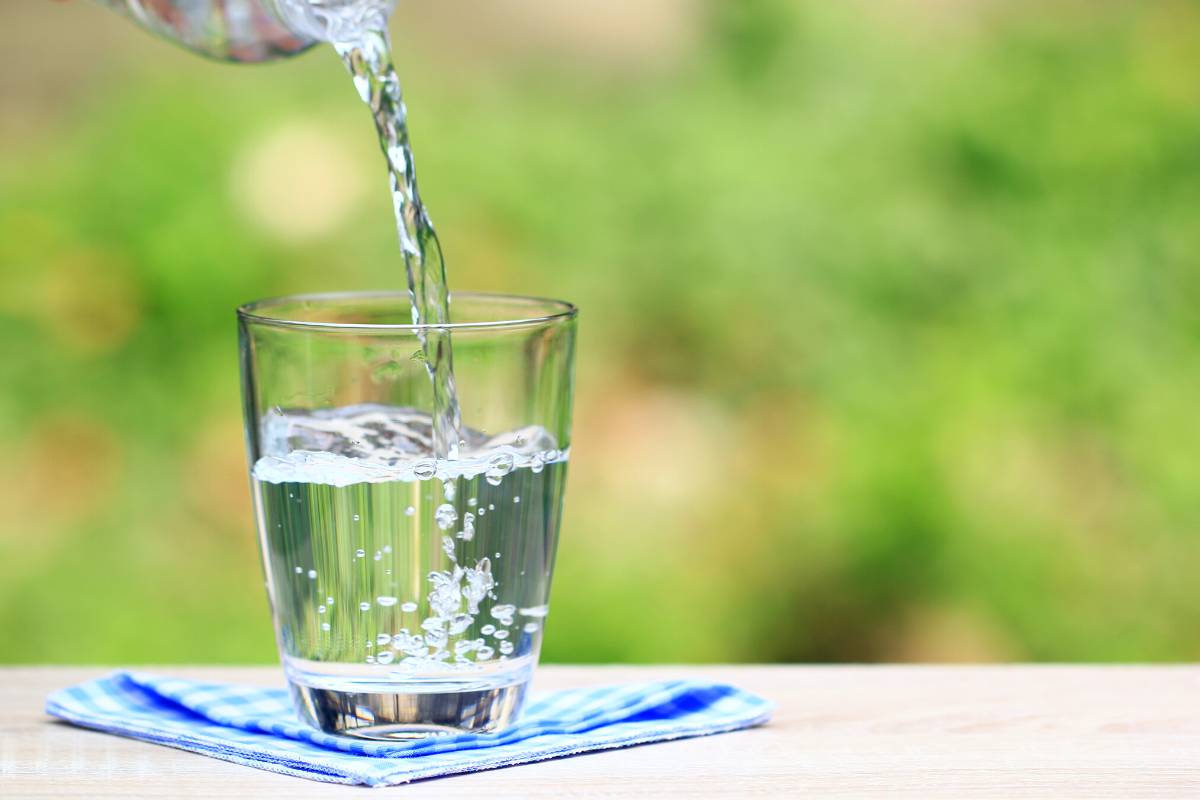 Water pouring out of a spout.