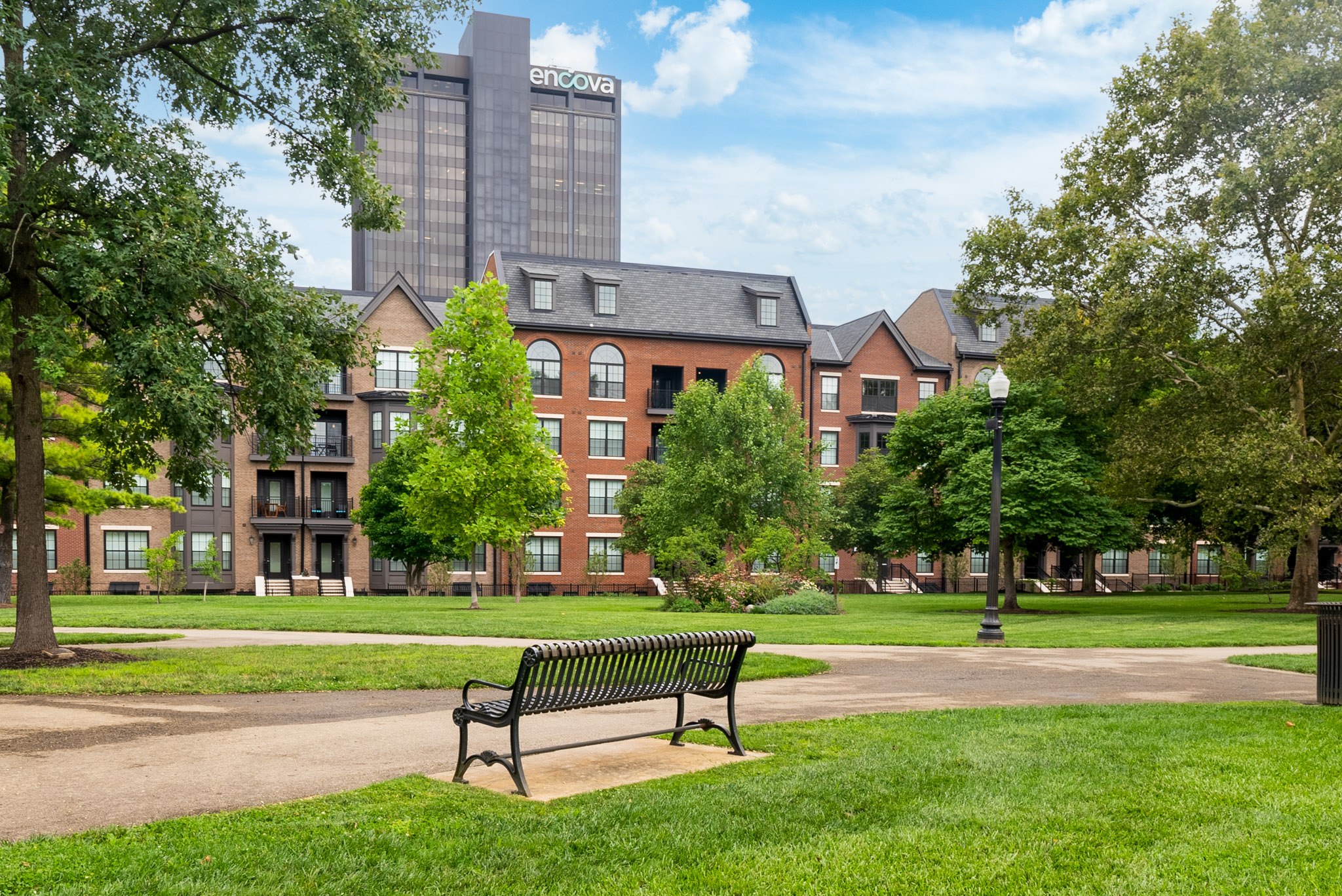 Residences at Topiary Park in downtown Columbus featuring park views, walking paths, and green space.