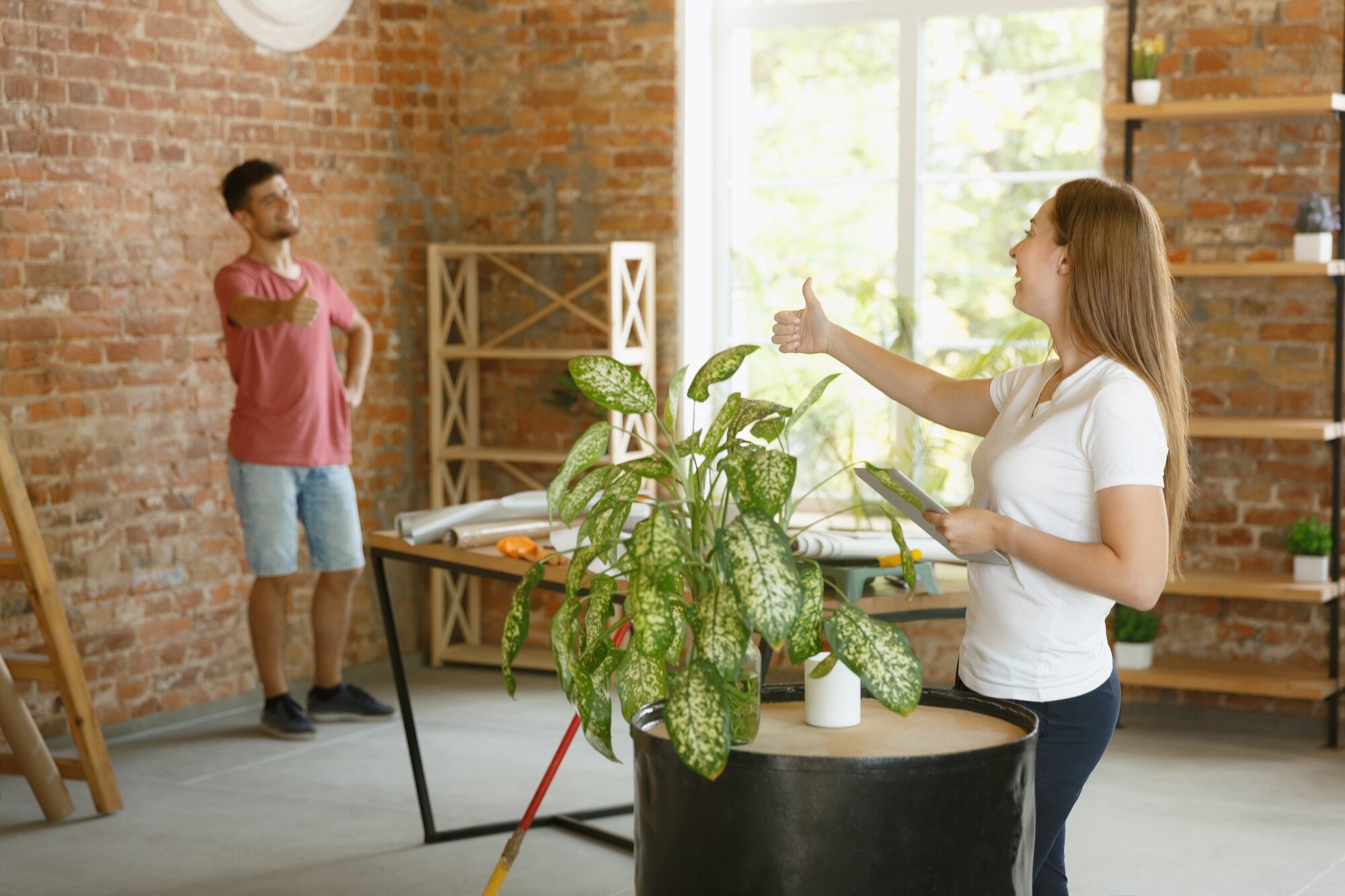 couple decorating their new apartment in woodcliff