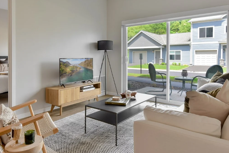 Cost of Living: Rochester MN Apartments Near Mayo Clinic - living room interior with furniture in a two-bedroom apartment near Mayo Clinic, Rochester MN Apartments the Lodge at overland