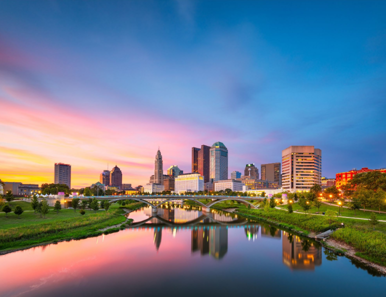 Downtown Columbus, Ohio skyline at sunset highlighting why physicians choose to live and work in Columbus.
