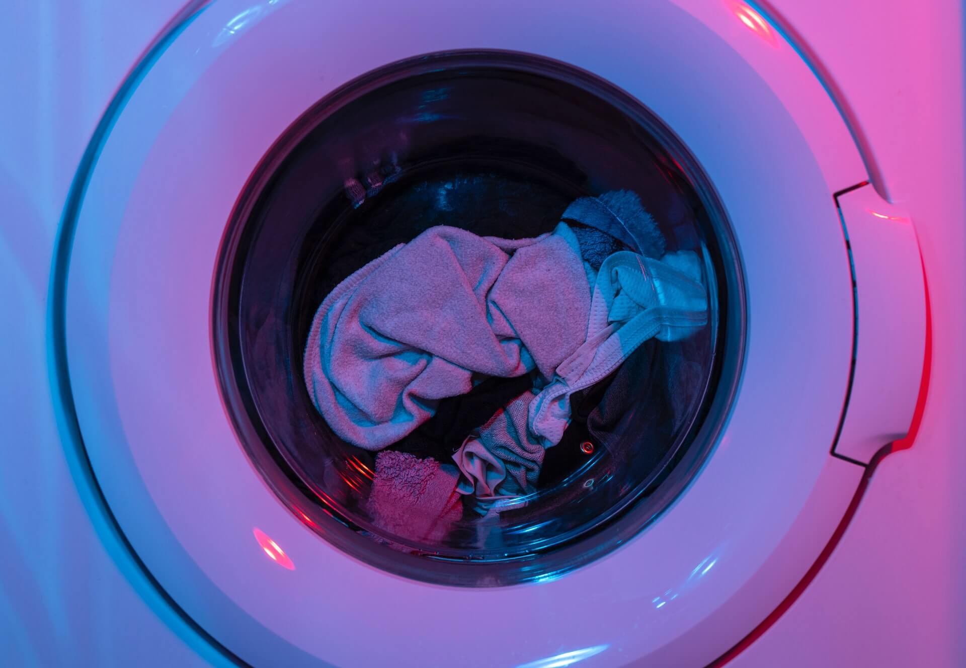 laundry machine with clothes in it