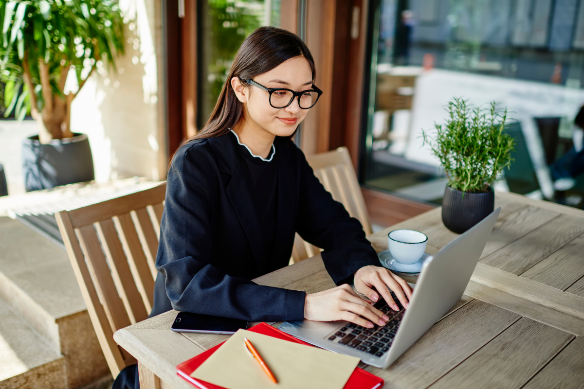 Remote worker starting the day working from a laptop in a comfortable home environment.