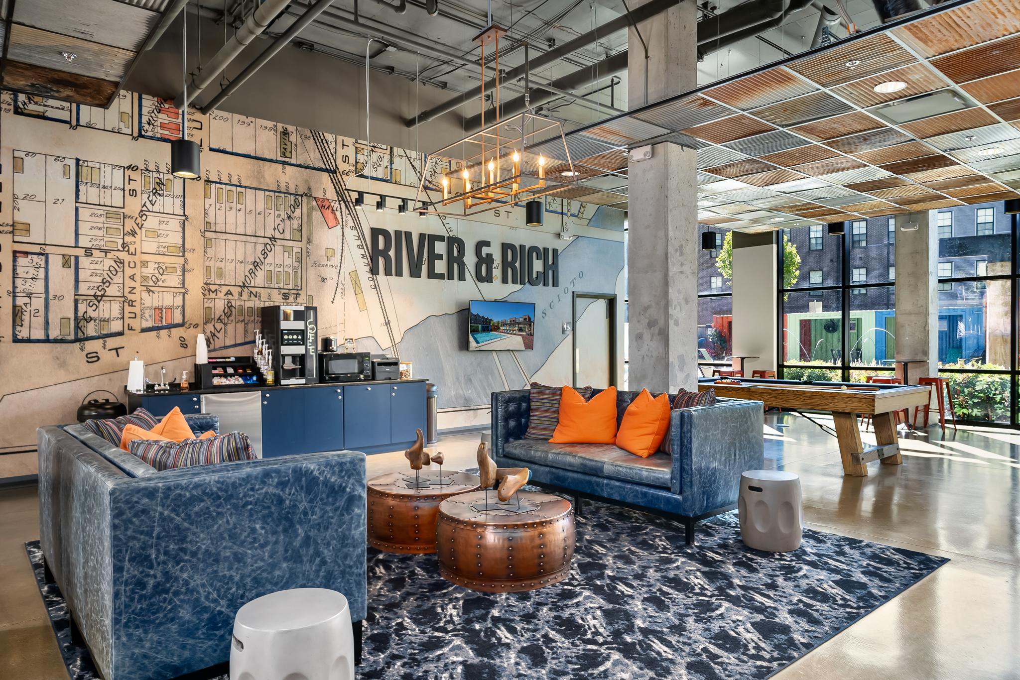 Modern resident lounge at River & Rich apartments in Franklinton, near The James Cancer Hospital.