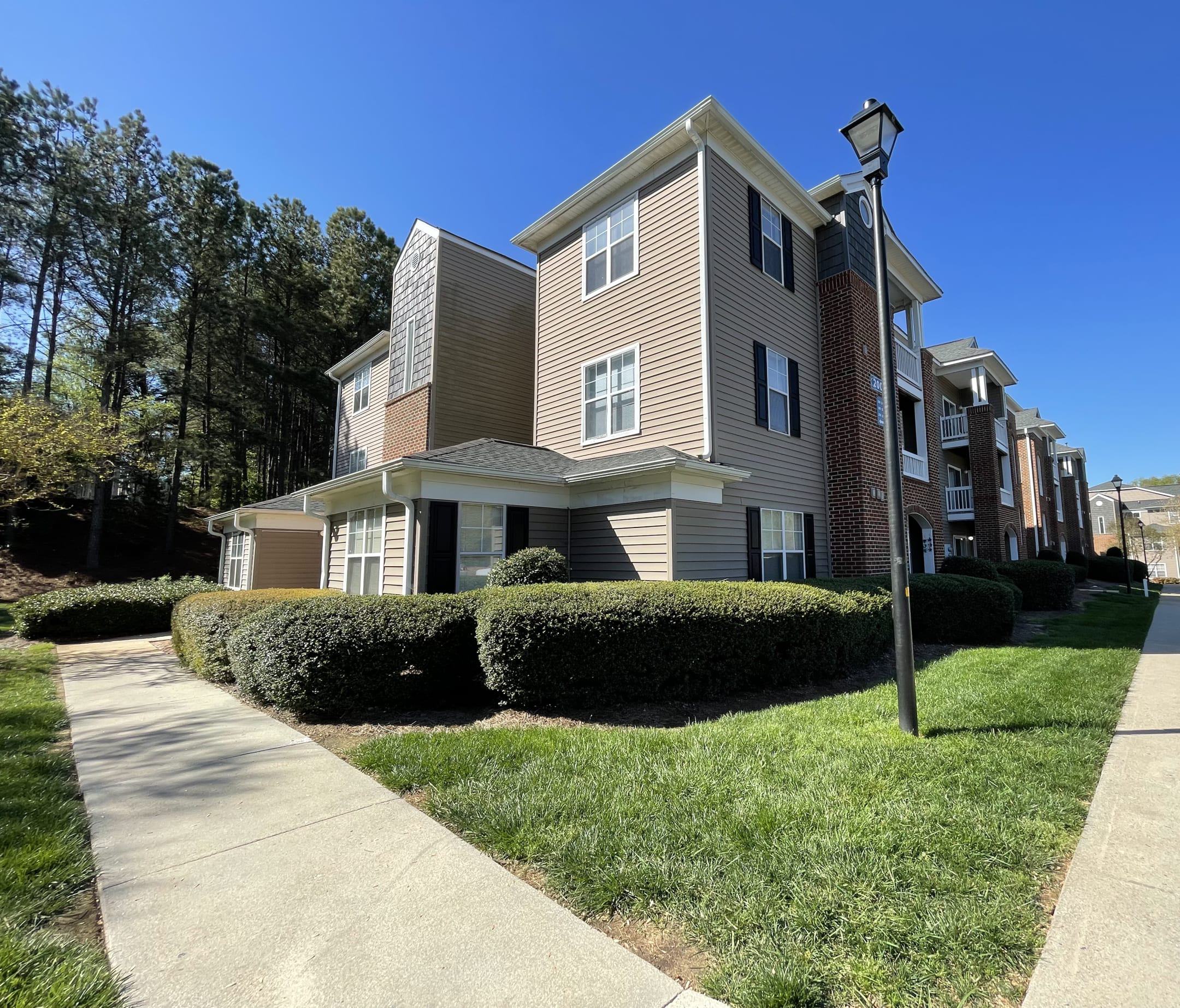 The exterior building of Palmetto Place Apartments in Fort Mill, SC.