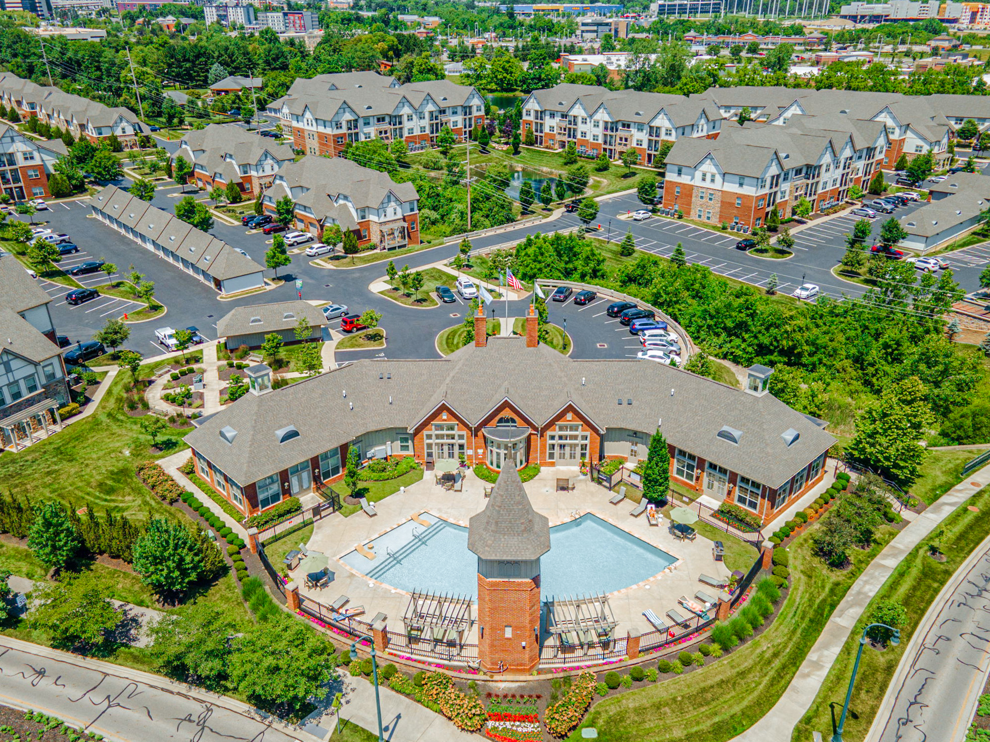 Aerial view of The Ravines at Westar apartment community with pool, clubhouse, and landscaped grounds.