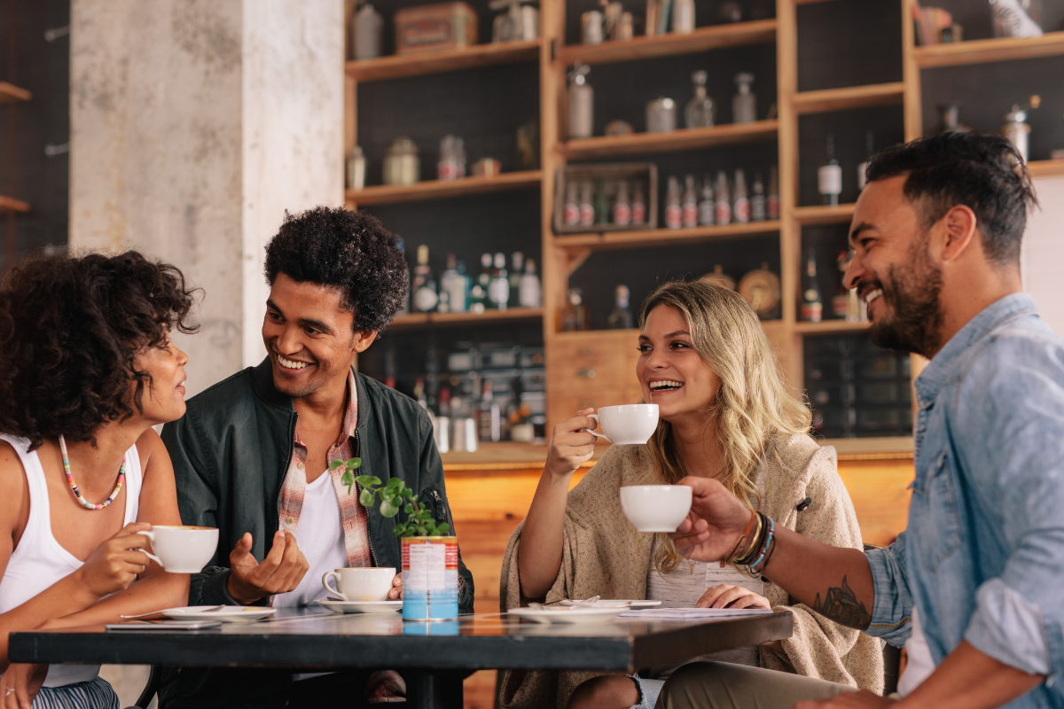 Friends enjoying coffee together at a local diner, reflecting Ohio’s small-town feel and sense of community.