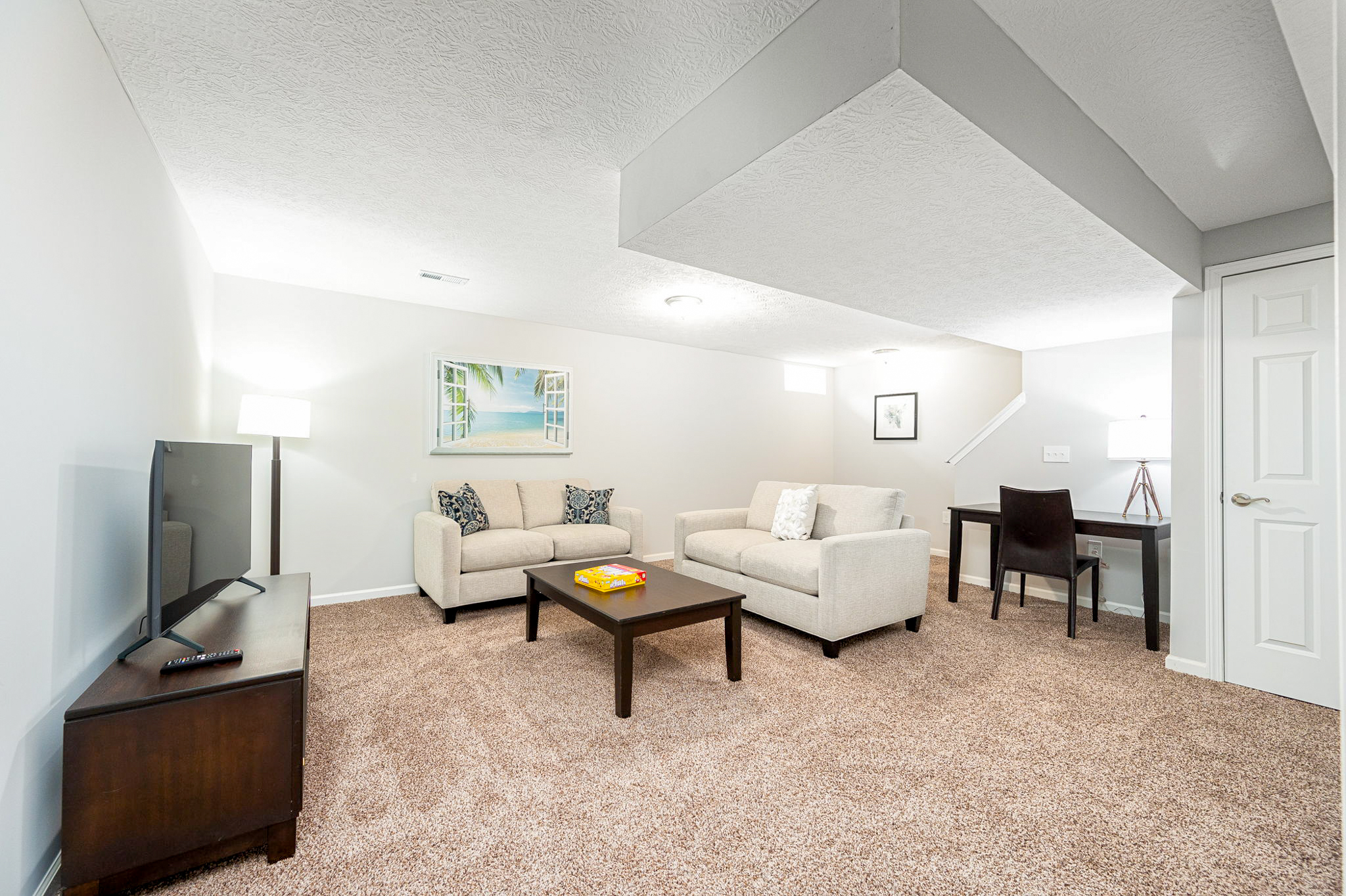 Cheswick Village interior near Polaris with finished basement, carpeted floors, and flexible layout.