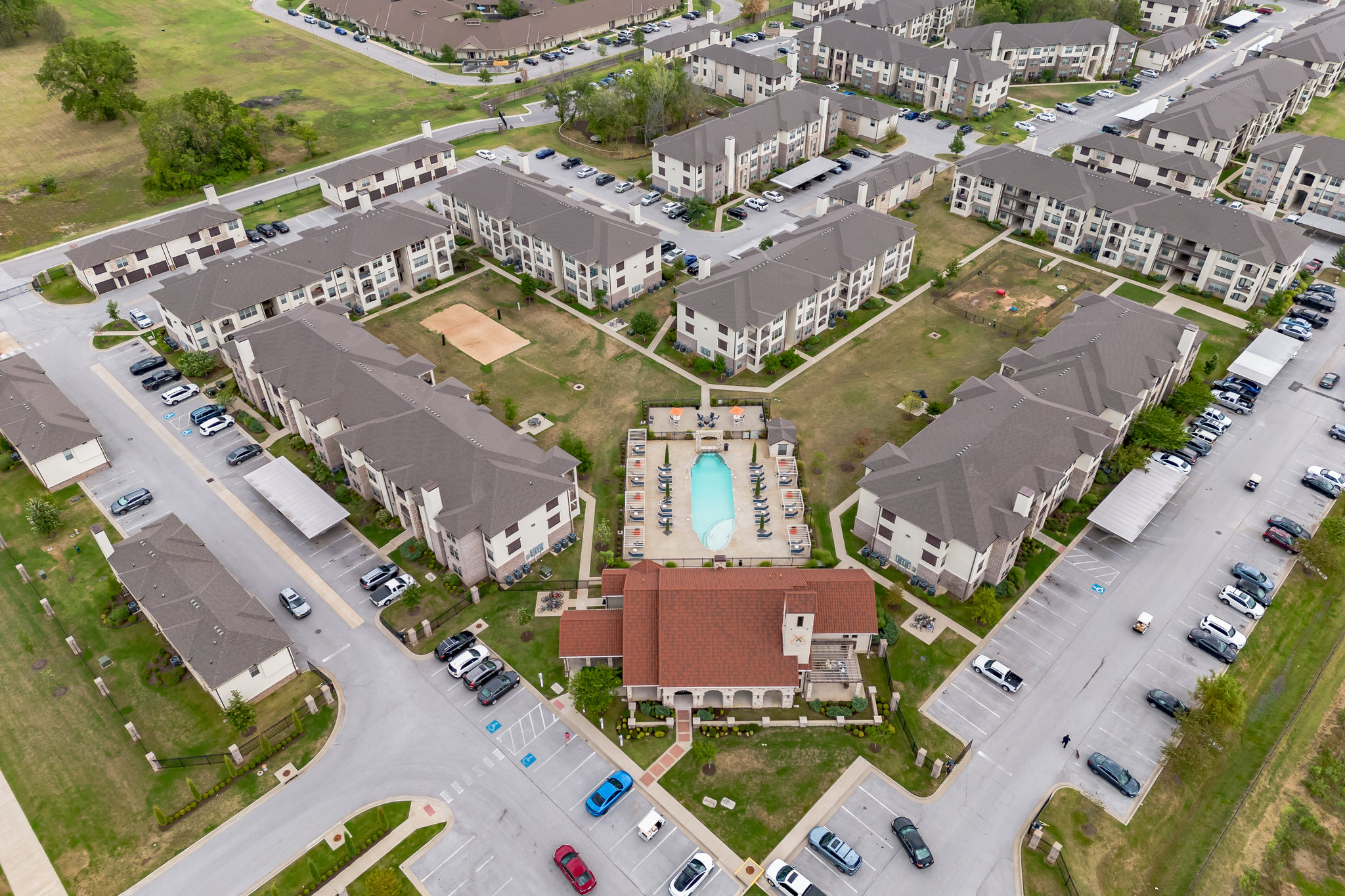 An image of the aerial view of Palisades at Pleasant Crossing Apartments in Rogers, AR.