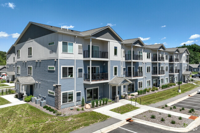 Cost of Living: Rochester MN Apartments Near Mayo Clinic - exterior of The Lodge at Overland Apartments in Rochester MN
