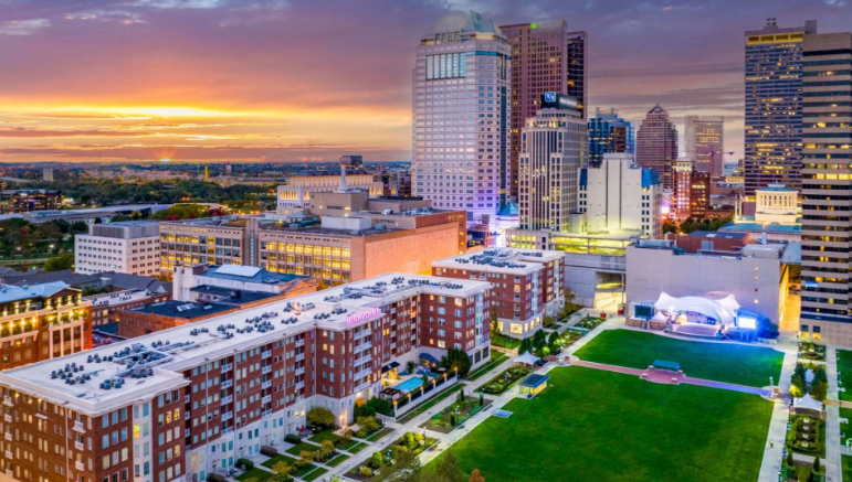 Highpoint on Columbus Commons apartments overlooking downtown Columbus at sunset near The Ohio State Wexner Medical Center.