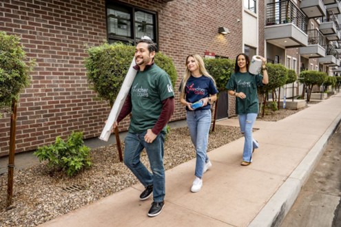 Weidner Apartment Homes associates working at one of the company's annual Weidner Cares philanthropy event.