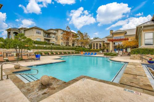 The outdoor pool at Panorama Villas Apartments in Austin, TX.
