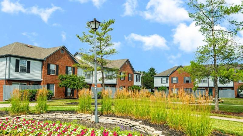 Outdoor view of Copperleaf Apartments in Dublin, Ohio, a pet-friendly community featuring an on-site dog park and play area for residents and their pets.
