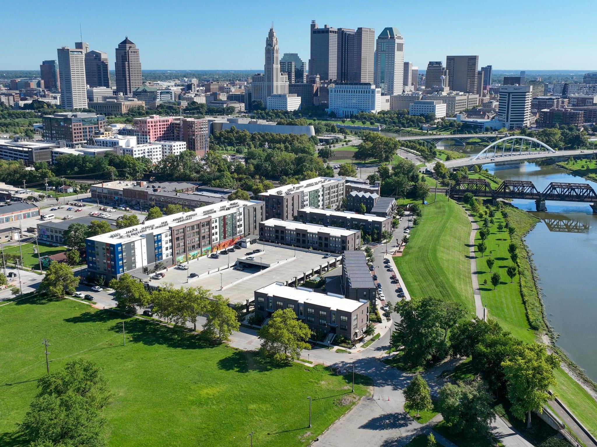 Alt Text: River and Rich apartments in Franklinton of Columbus, Ohio featuring underground parking garage, courtyard pool, and modern urban living spaces.