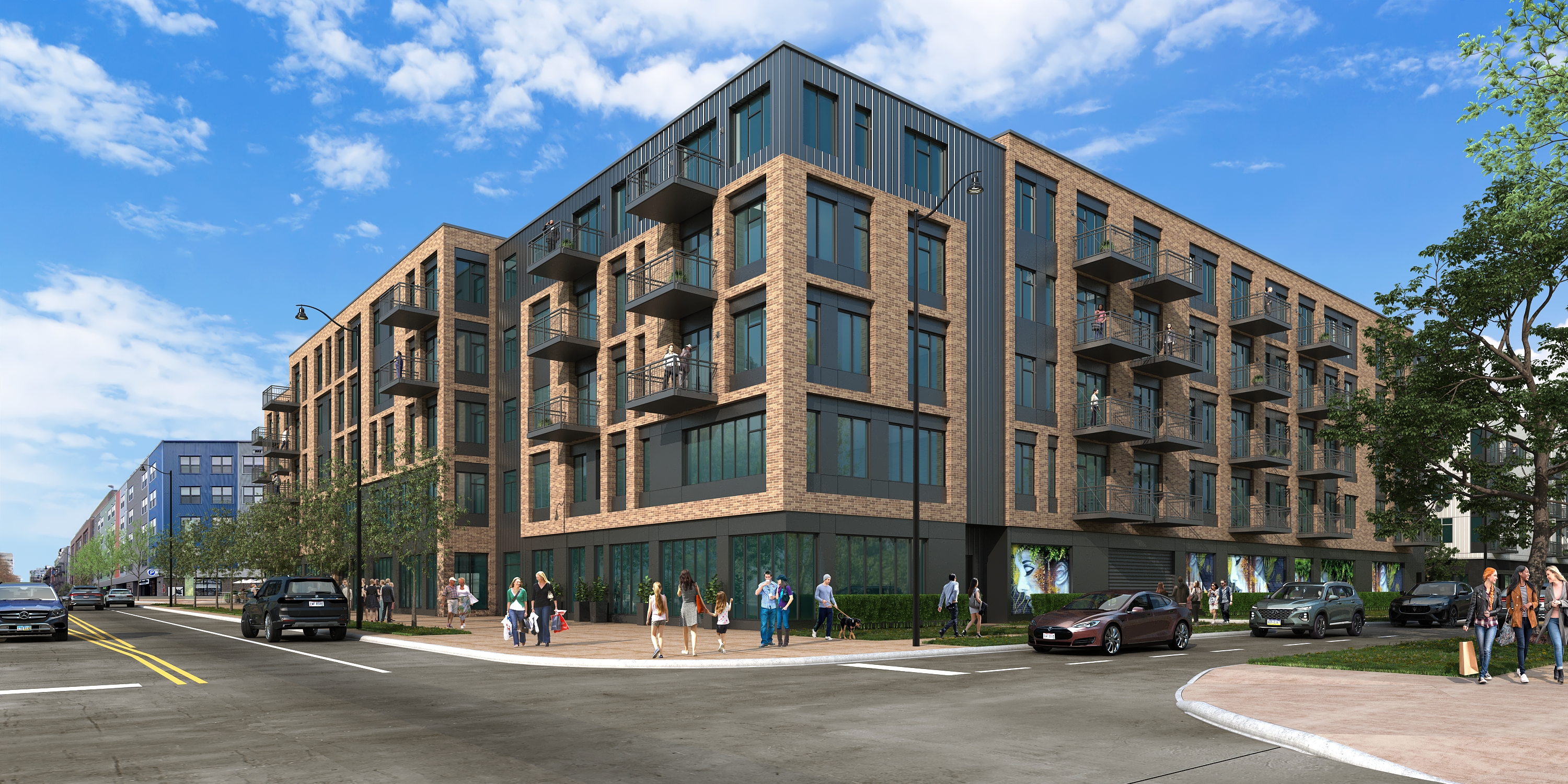 Exterior of Westrich apartments in Franklinton, featuring contemporary architecture, private balconies, street-level retail space, and a walkable location just minutes from Downtown Columbus.