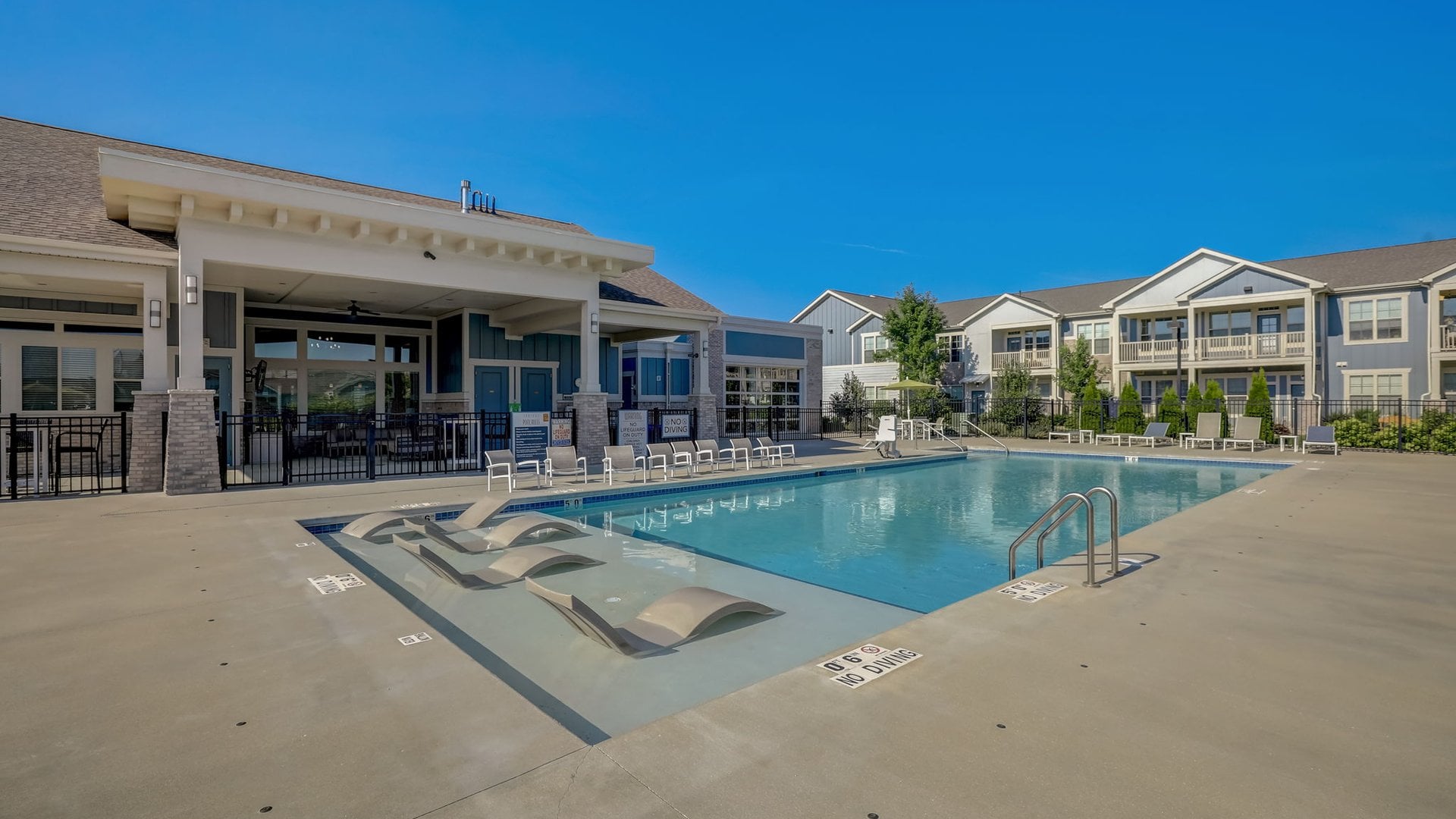 The outdoor pool at Aster at Sun Prairie Apartments in Sun Prairie, WI.