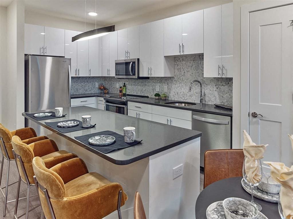 Kitchen with breakfast bar seating at Vermella Union, Union NJ