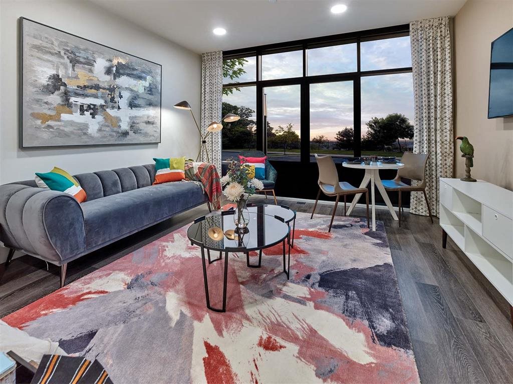 Apartment home with large windows and vibrant furnishings at Vermella Union, Union NJ