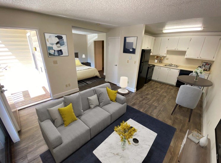 Pleasant Hill CA Apartments - Open Layout Living Room with Hardwood Floors and Stylish Interior