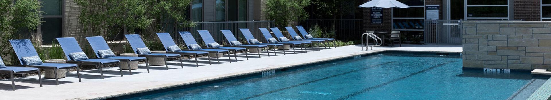 pool deck with chairs