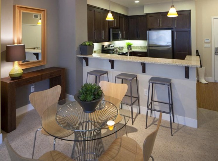 Model apartment home dining room and kitchen