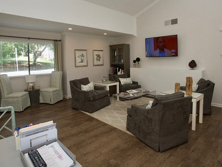 Leasing office at Countryside Villa with chairs, coffee station, and television