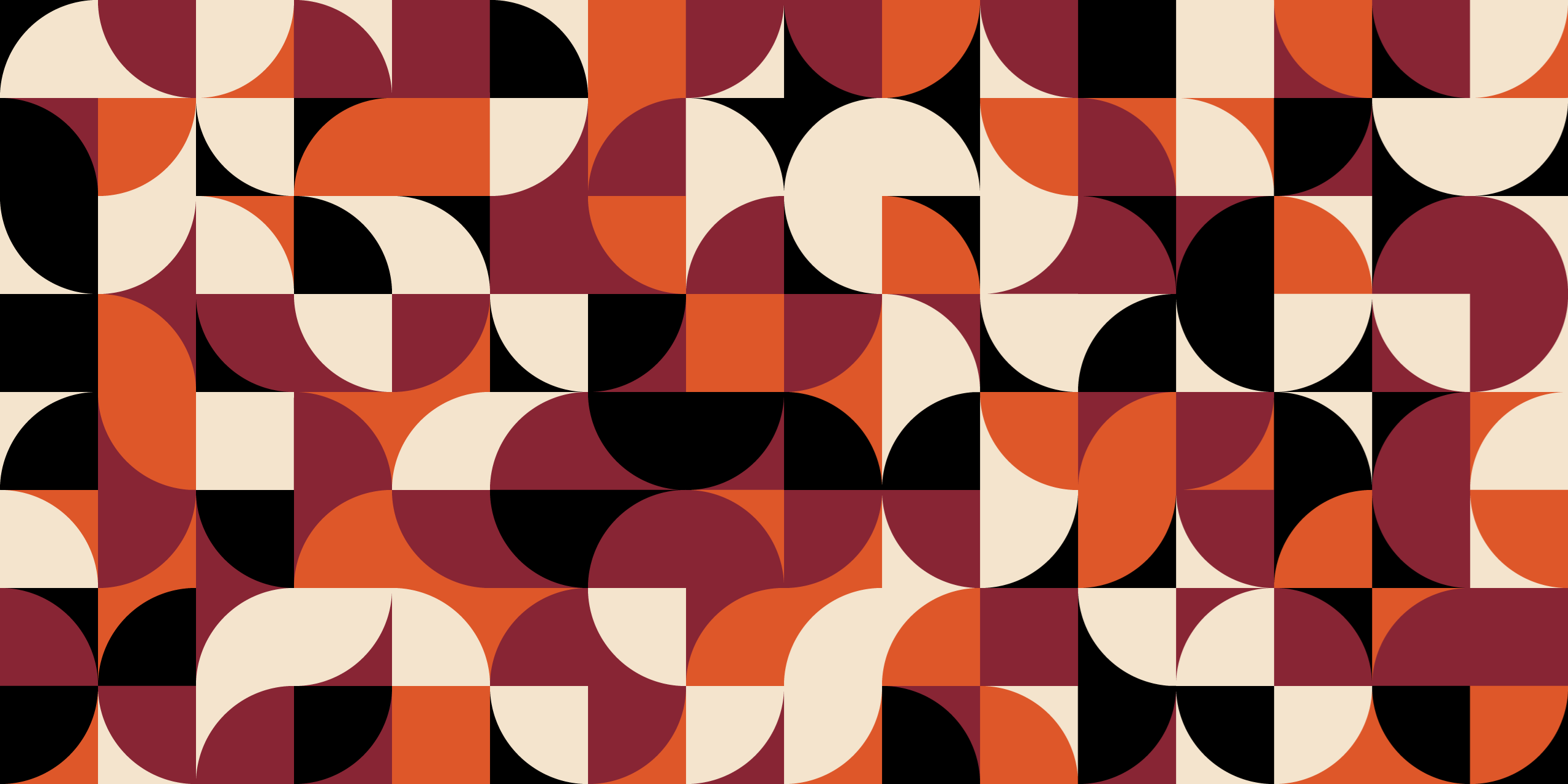 A pattern of overlapping circles in shades of orange, black, and white.
