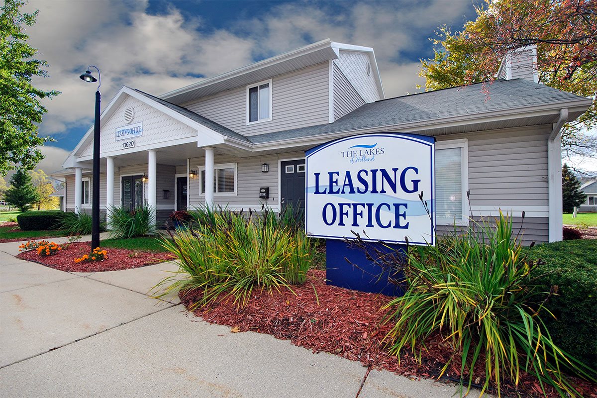 the lakes of holland apartments leasing office sign