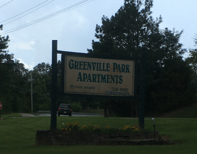 the sign apartments by the city