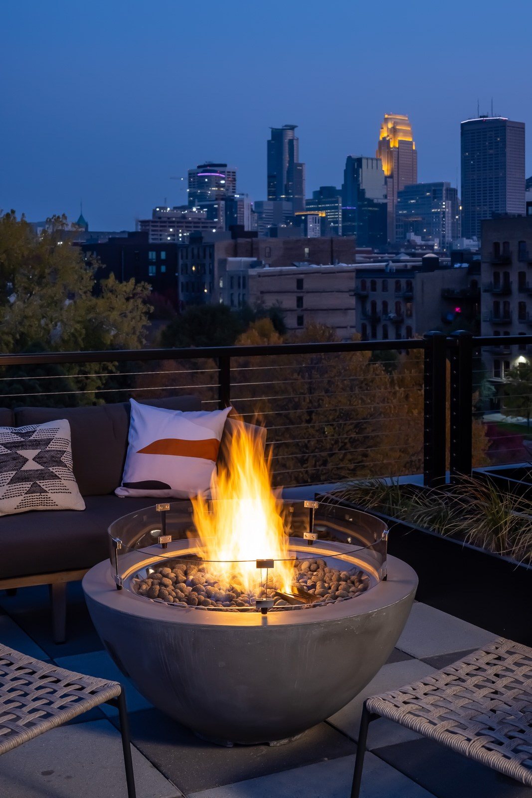 View of downtown minneapolis from rooftop lounge terrace at Vesi apartments