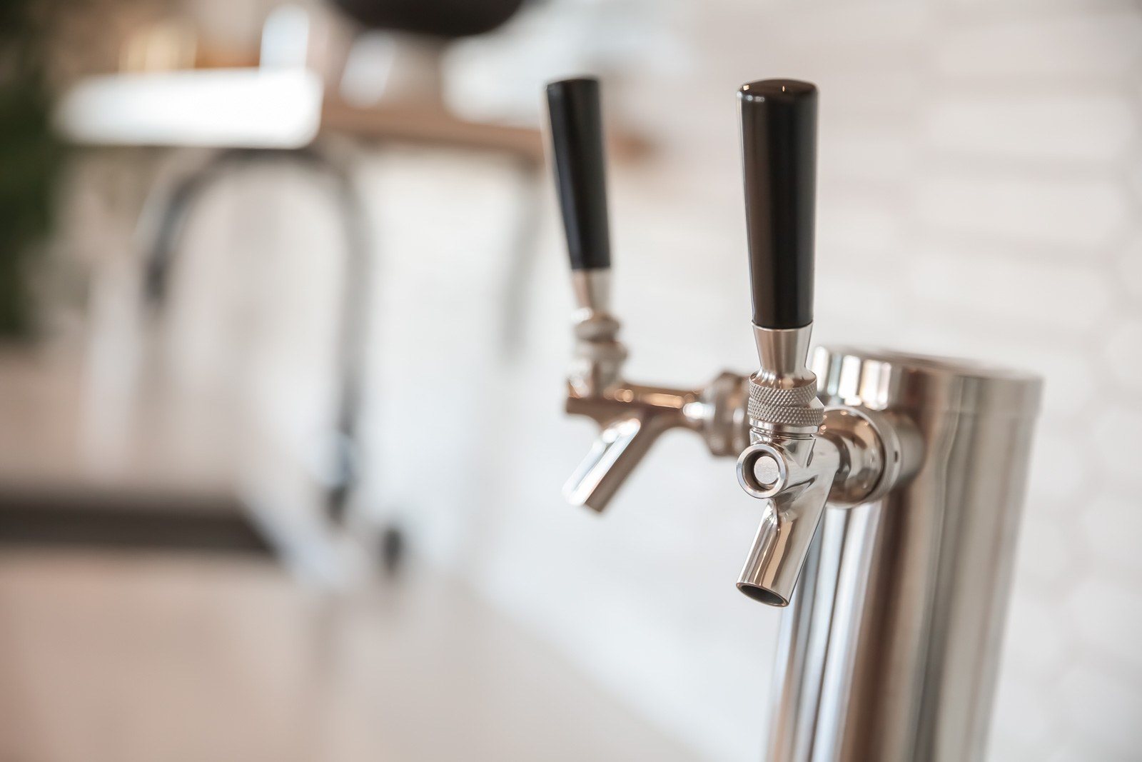 Rotating beer and kombucha tap in social lobby at Vesi