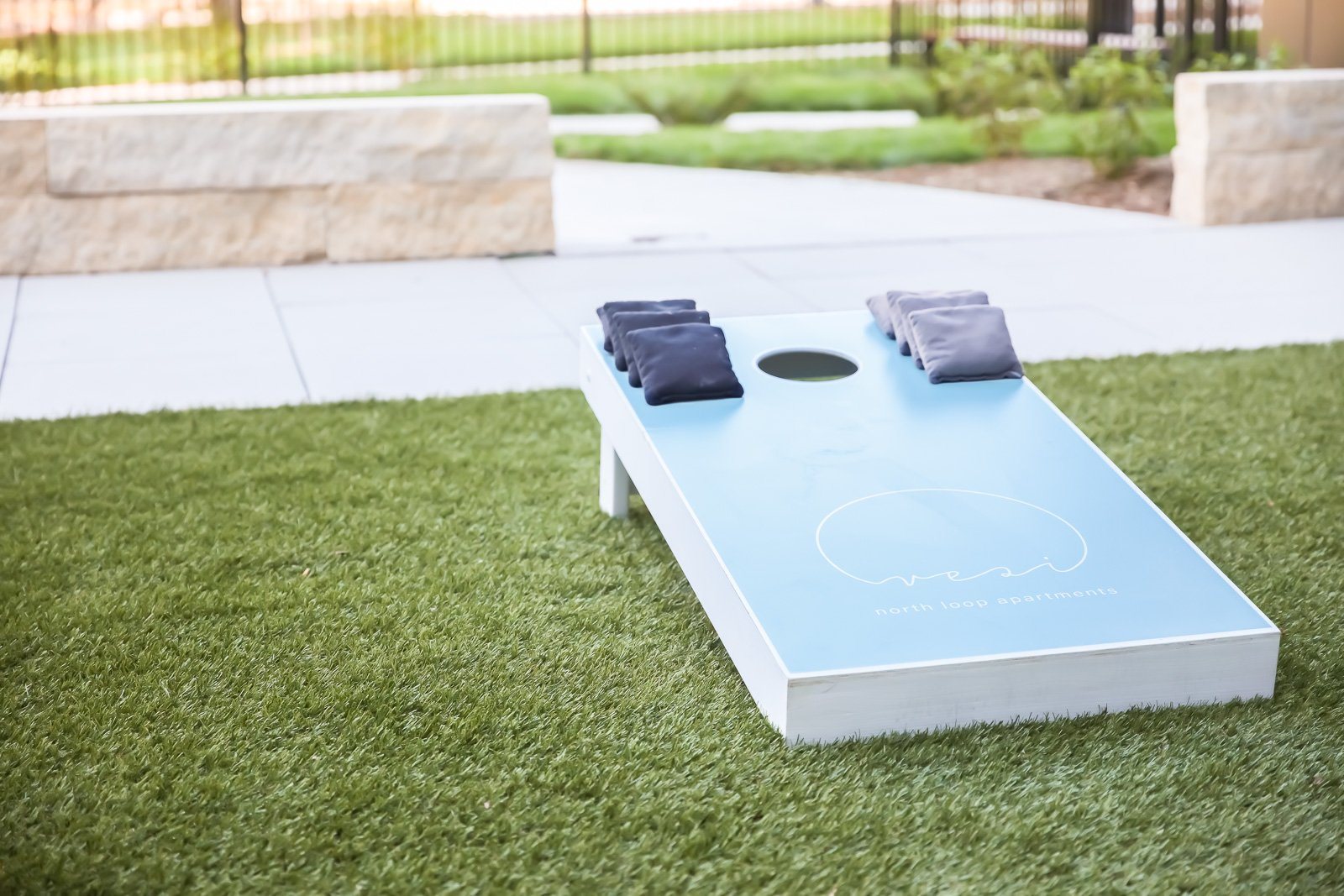 Cornhole or Bean Bag toss on artificial turf