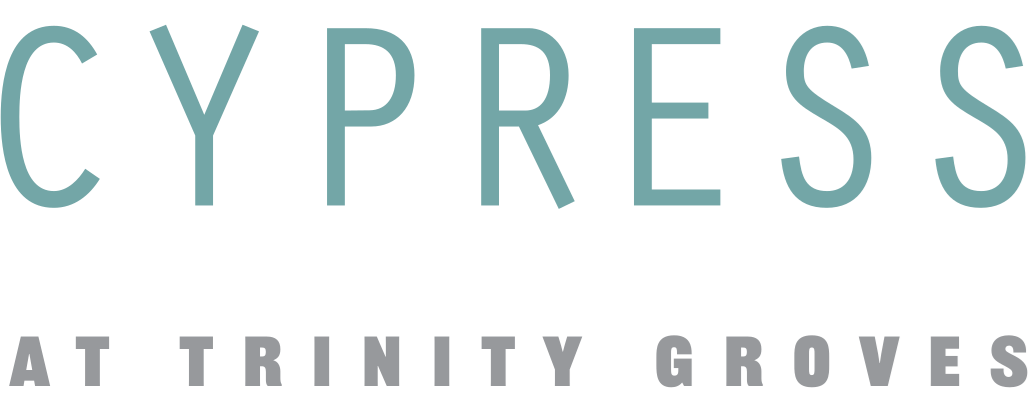 A green sign with the word "CYPRESS" in large letters.