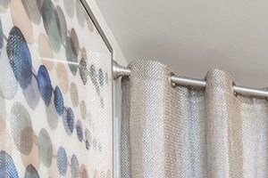 Bathroom with sink, mirror, lighting, toilet, and shower tub