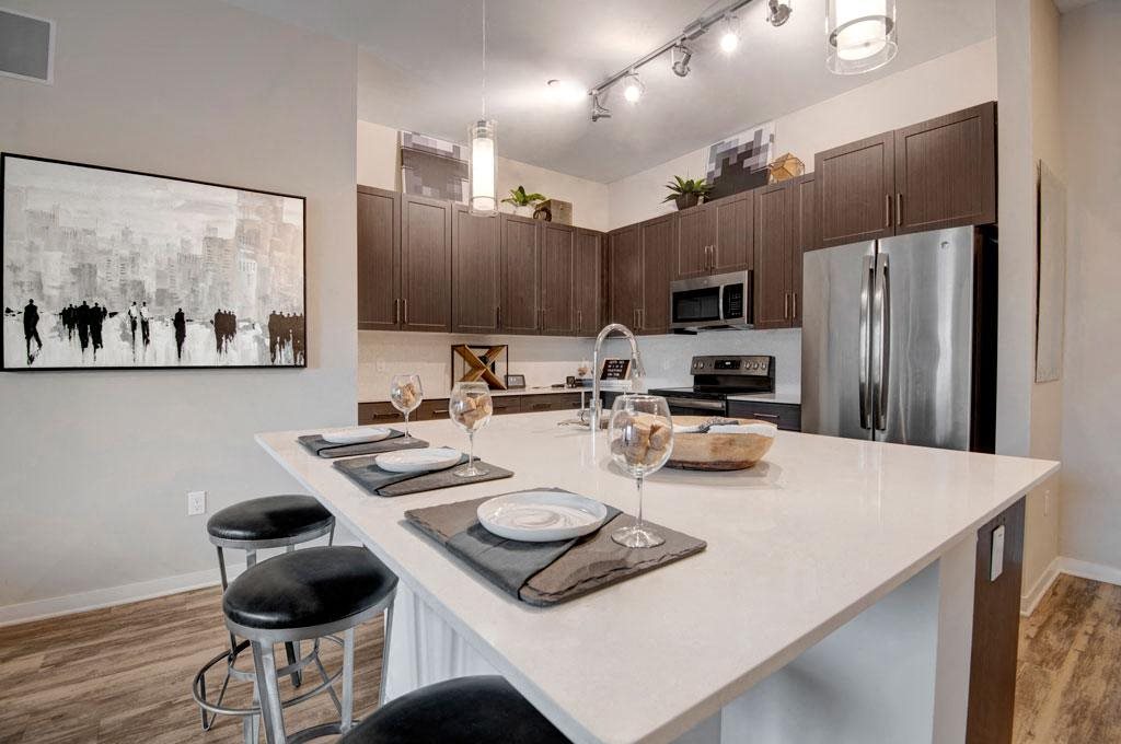Park on Central Kitchen with hardwood floors, kitchen table and stainless steel appliances