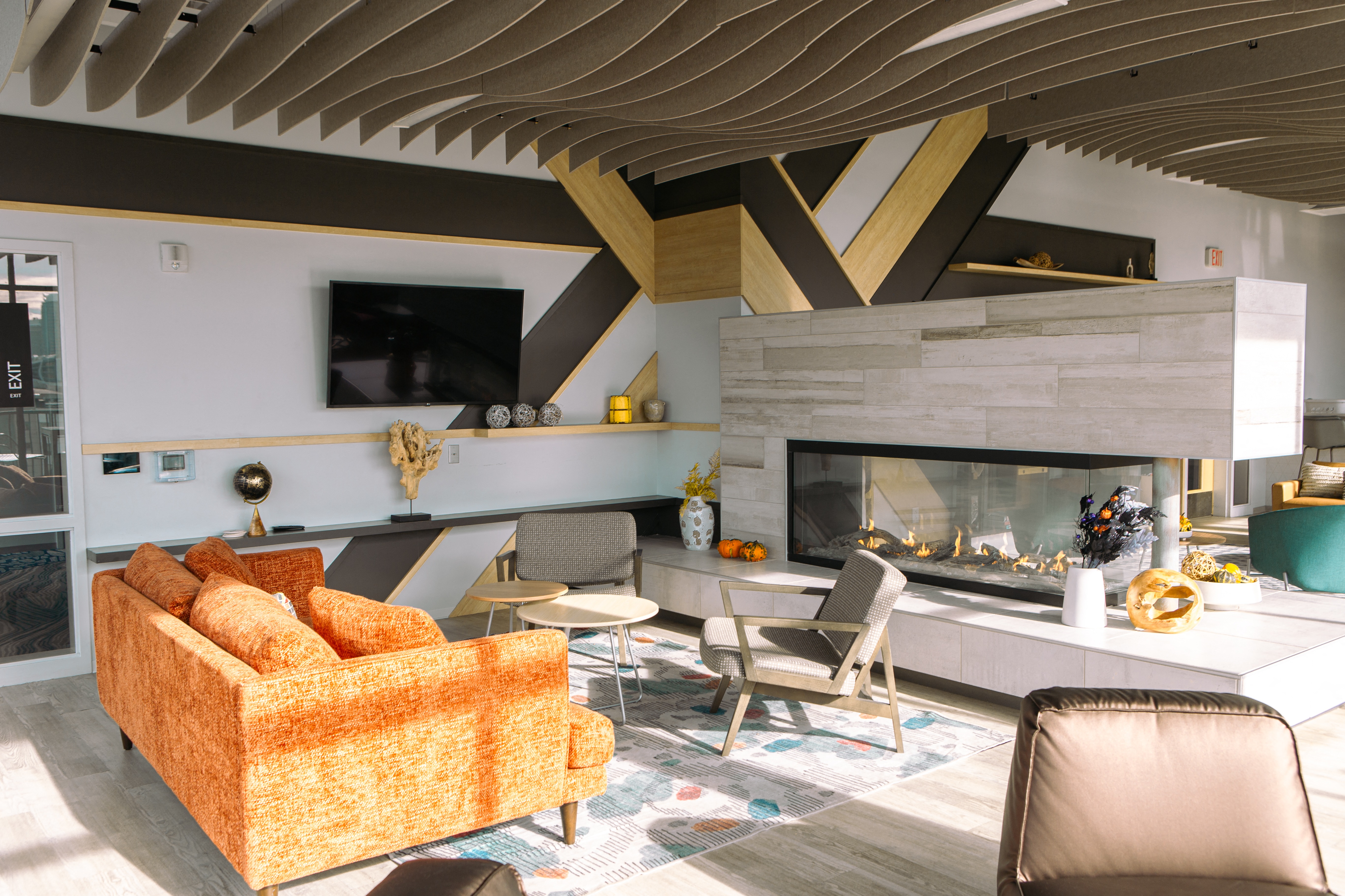 a living room with a couch and a fireplace
