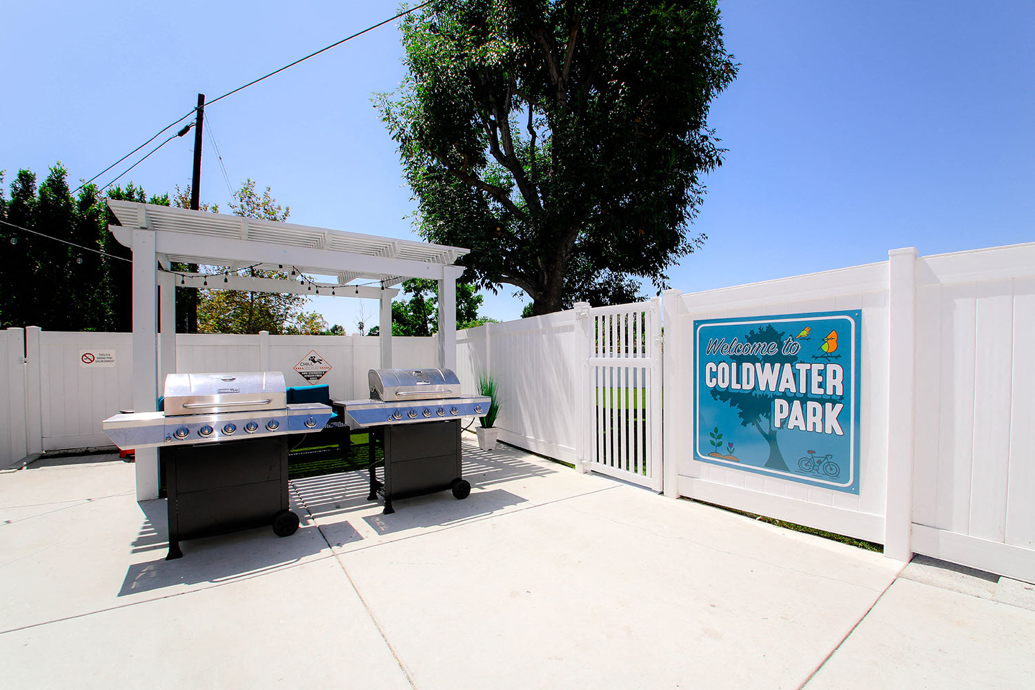 The entry to our private community park with barbecues and seating area.