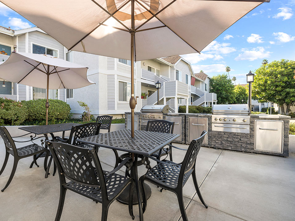 Outdoor barbeque and seating space in main courtyard.