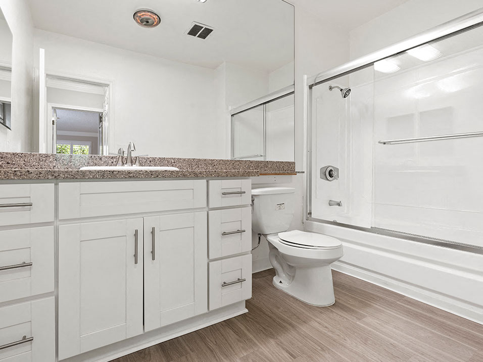 Modern styled bathroom with shower and tub.