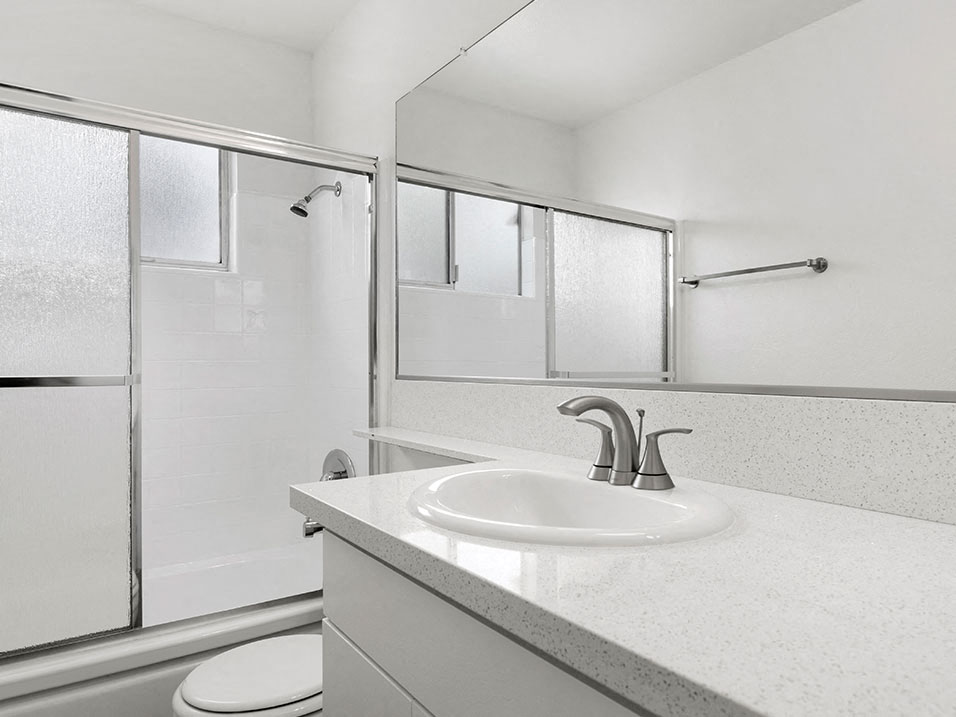 Modern styled bathroom with shower and tub.