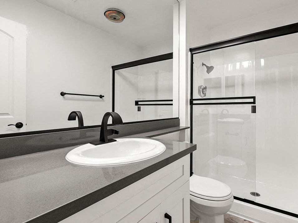 Modern styled bathroom with shower and tub.