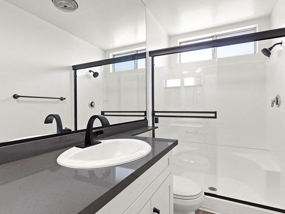 Modern styled bathroom with shower and tub.