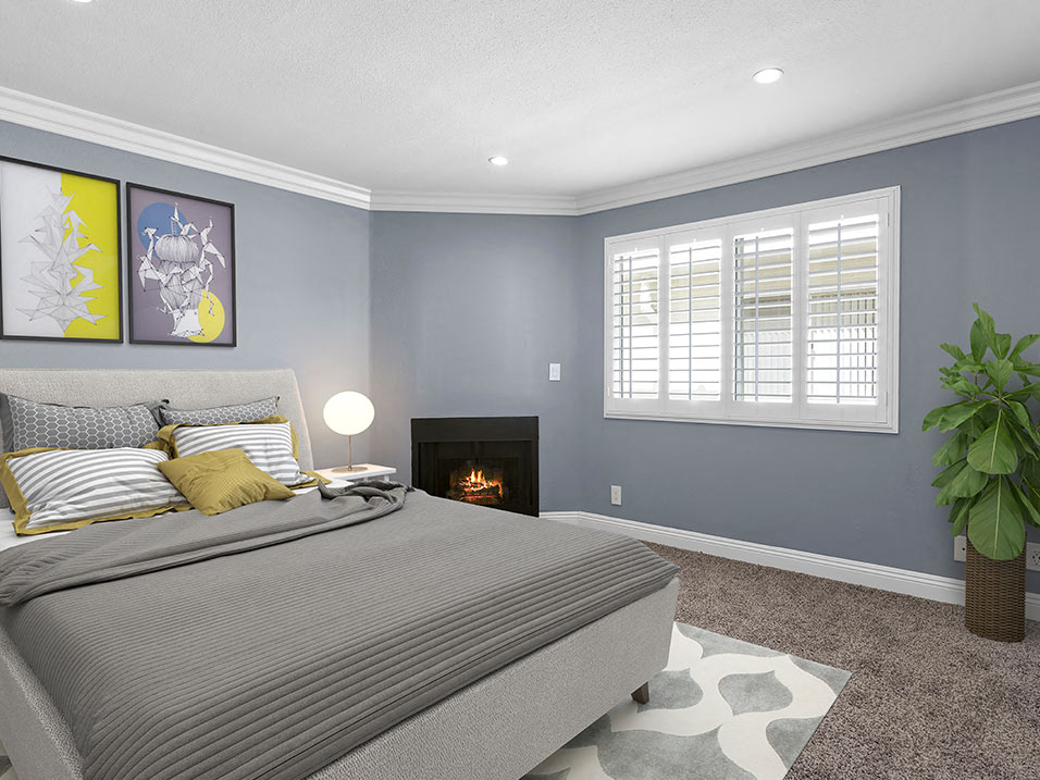 Brightly lit upstairs bedroom with new carpeting.