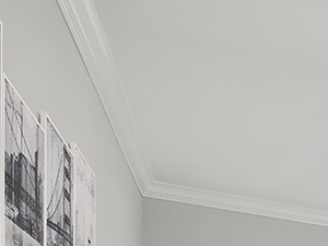 Carpeted bedroom with ceiling fan and private bathroom.