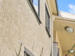 Drought-tolerant greenery and courtyard at Woodridge Apartments.