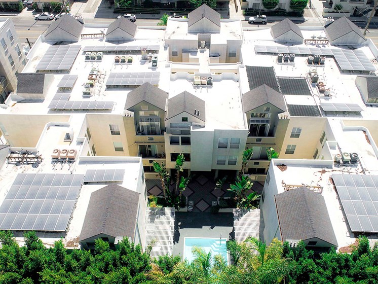 Aerial drone image of Palms Court Apartments.