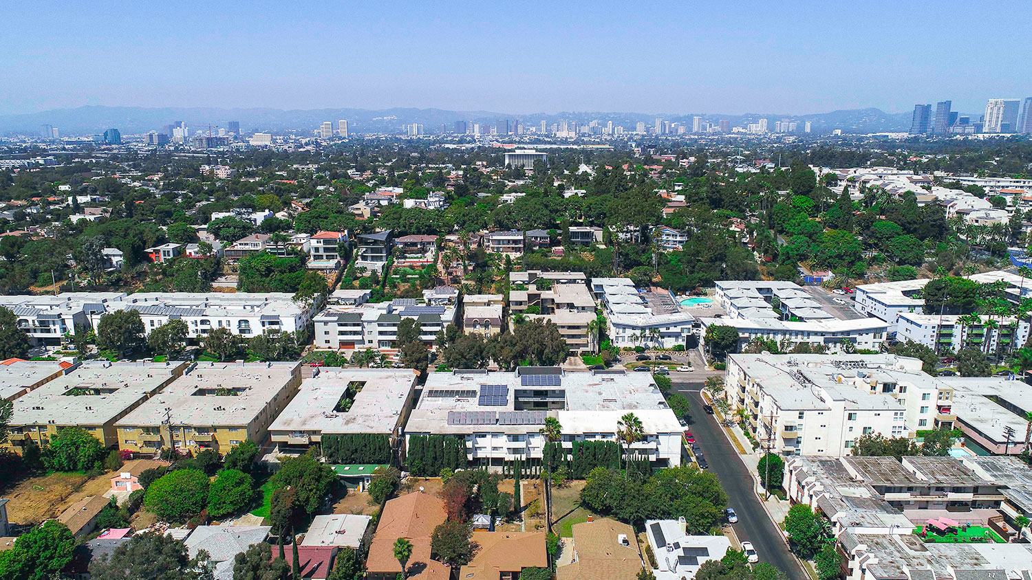 Aerial drone image of Rose Apartments and surrounding neighborhood.
