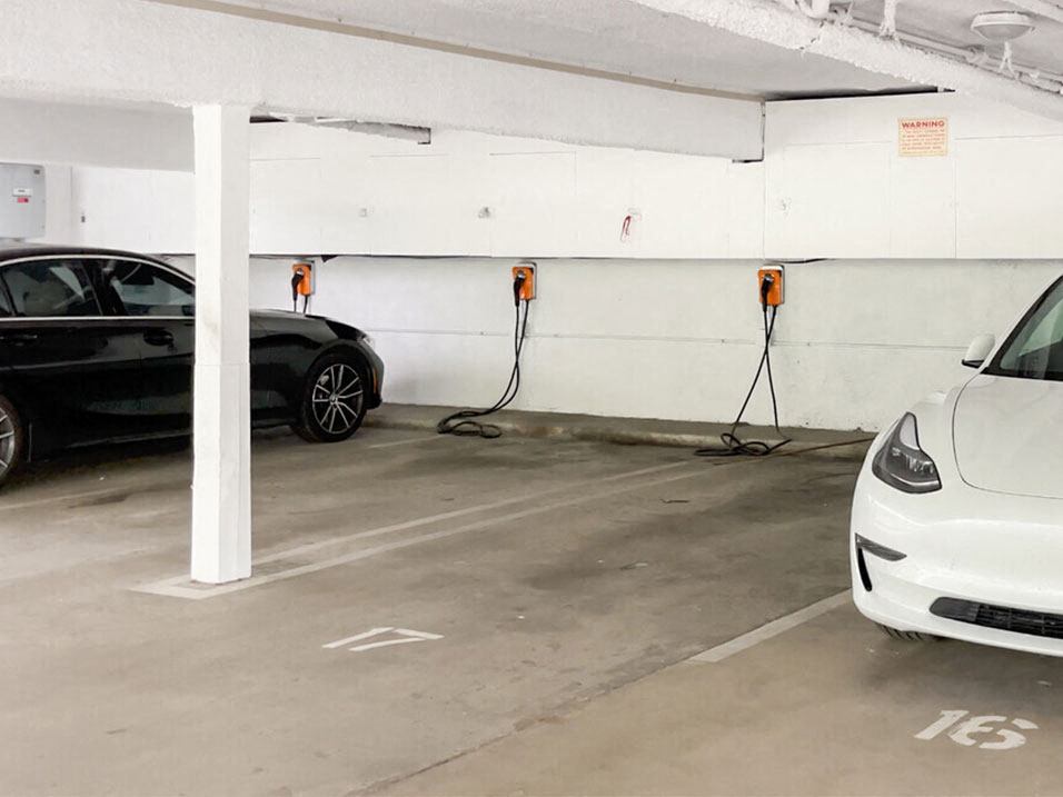 Large covered parking lot with EV Chargers.